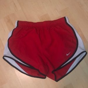 red nike running shorts